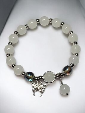 White Beaded Bracelet with Silver Butterfly Charm